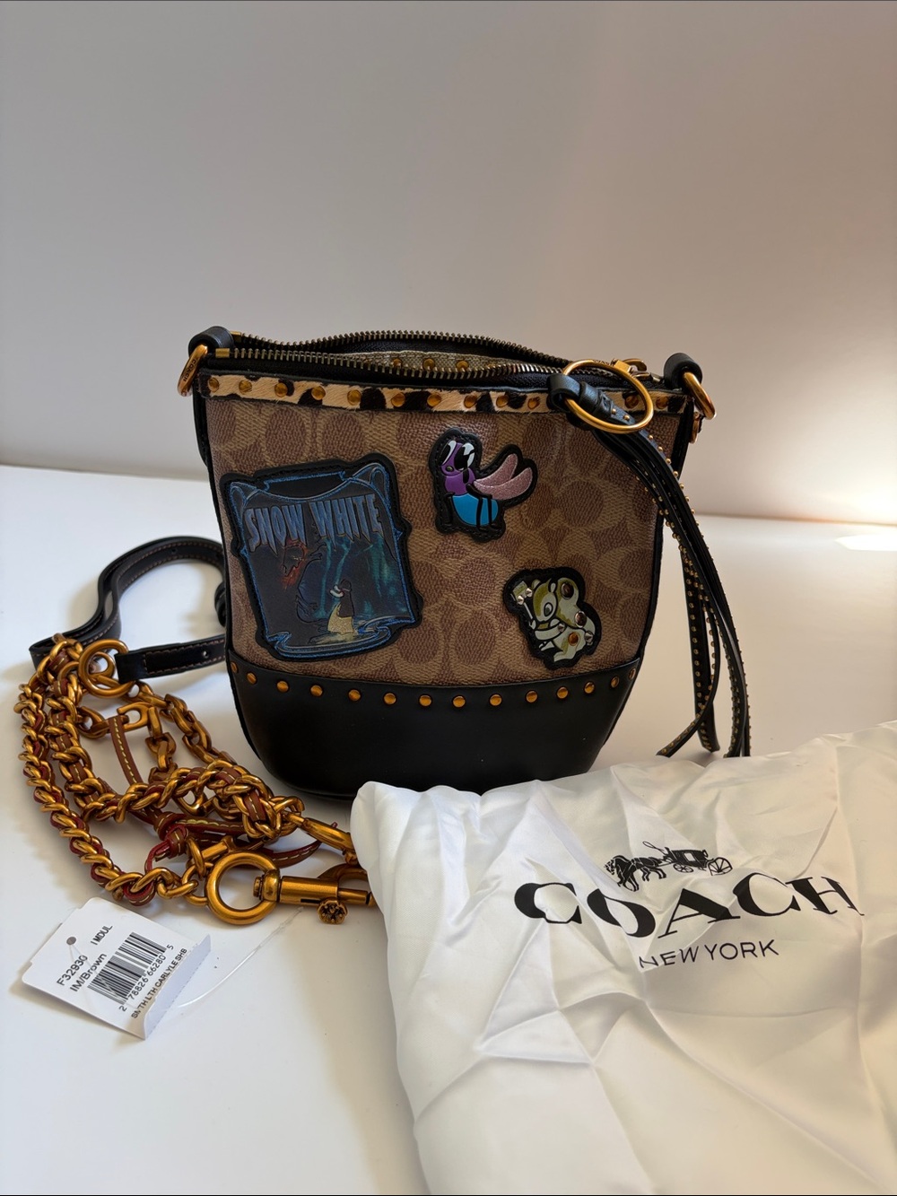 Coach Snow White Brown Signature Canvas Crossbody with Black Trim & Gold Chain